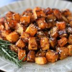 Serve your air fried butternut squash while hot, sprinkle some fresh parsley on top